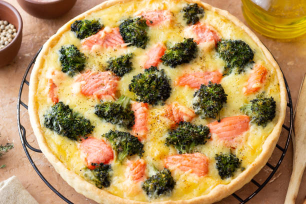 istock Quiche or pie with salmon and broccoli. French cuisine. 2065187382