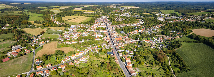 Aerial around the old town of  Sainte-Menehould on a sunny day on a late afternoon in early summer.