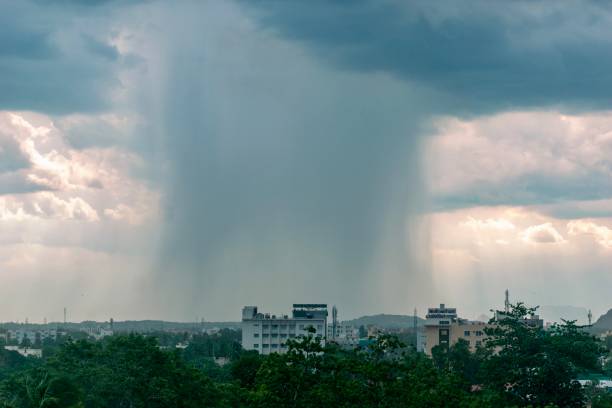 Gathering Storm Over Urban Landscape Captured at Twilight