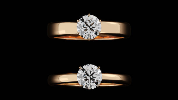 istock Two diamond rings on a black background. Designed with 3D renderings, close-up top view. 2065224274