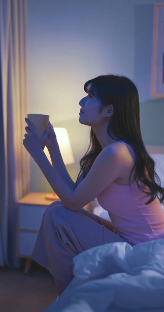 istock asian woman herb tea bedtime 2065238748