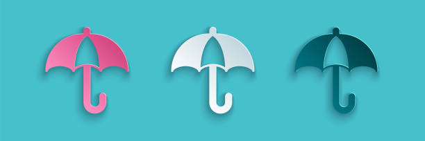 istock Paper cut Classic elegant opened umbrella icon isolated on blue background. Rain protection symbol. Paper art style. Vector 2065241423