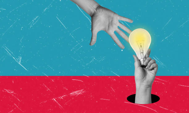 istock Creativity and new ideas in business. Hand with a light bulb. 2065246235