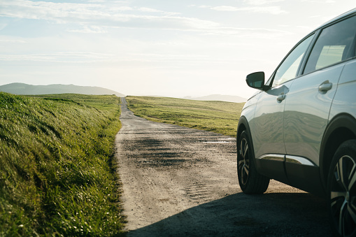 Zagreb, Croatia - August 2, 2012: Futuristically styled Citroen DS5 driving fast in the corner on the mountain road.