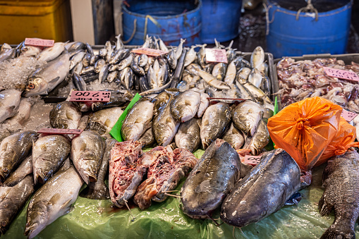 Different kinds of fish put up for sale at a market stall in the central Chow Kit market in the center of the Malaysian capital Kuala Lumpur