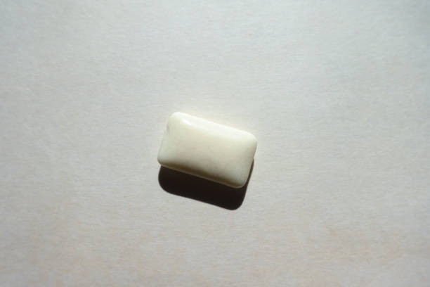 istock Macro of one white rectangular piece of chewing gum 2065286878