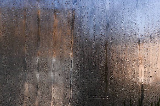 istock wet window glass with water droplets. background. 2065301968