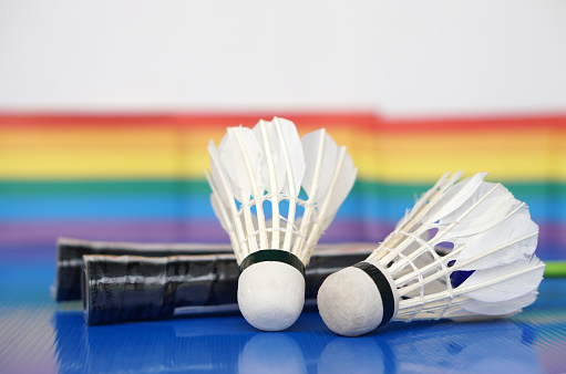 Badminton shuttlecock, sport equipments. Concept, sport, exercise, recreation activity for good health. Popular sport for all genders and LGBTQ+ worldwide.