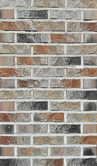 pastel color brick wall vertical photograph