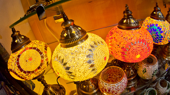 coloured lamps in a street market - Marrakesh souk, Morocco
