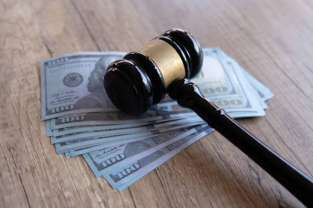 istock Closeup image of gavel and money. 2065346921
