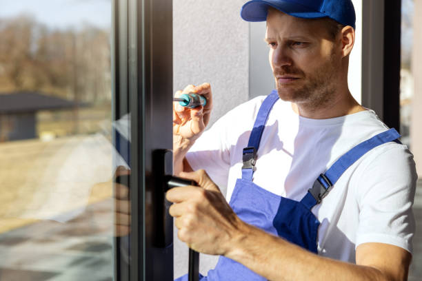 istock worker installing and adjusting aluminium frame sliding terrace doors 2065351713