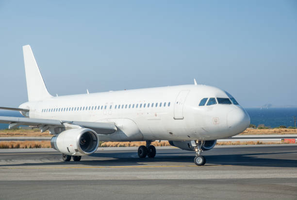 Generic white aircraft exiting the runway