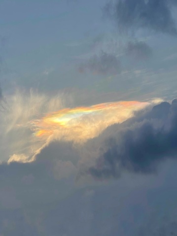 Iridescent pileus cloud The beautiful natural phenomenon.
