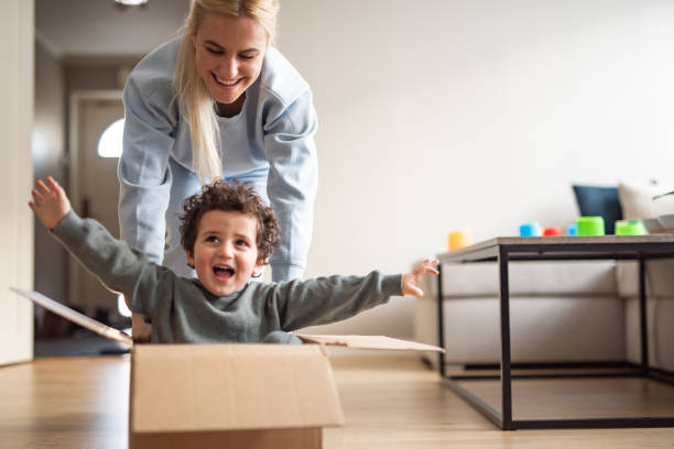 istock Boy enjoys driving the box 2065423304