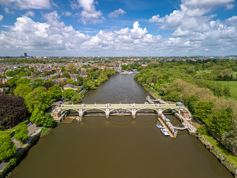 The drone aerial view of Richmond Lock and weir on the River Thames. Richmond Lock and Footbridge.
