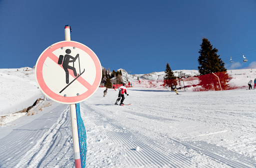 Caution warning sign for backcountry skiing in Copper Mountain Colorado during the winter