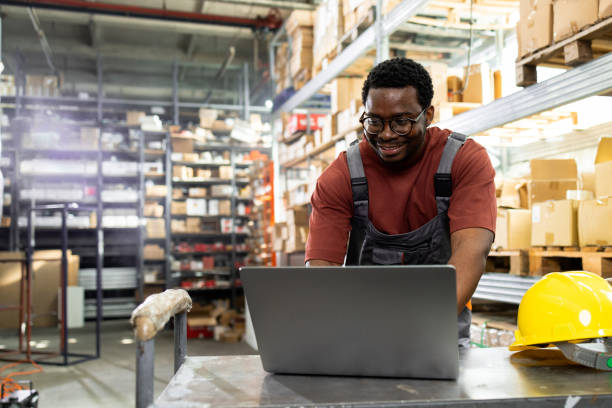 istock African American worker at the warehouse planning the storage 2065472092