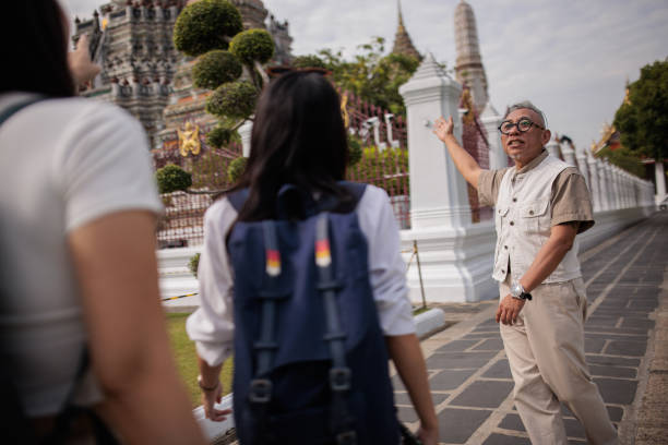 istock Women tourists with guide 2065504483