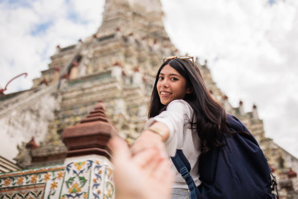 istock Woman tourist visiting Wat Arun 2065516222