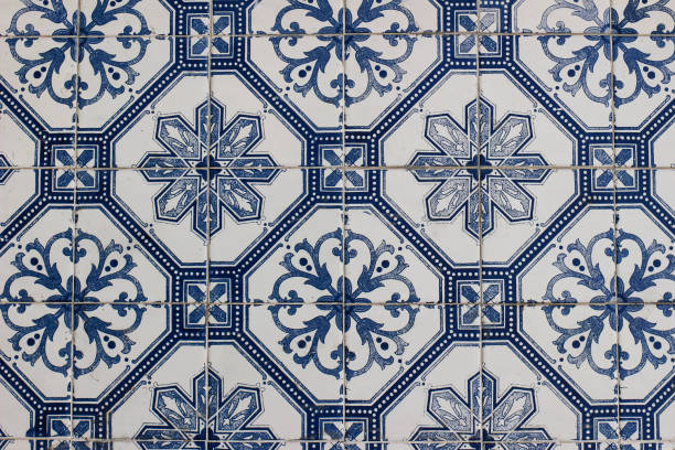 istock Blue traditional Portuguese ceramic tile pattern, azulejos. Beautiful shabby dirty facade, wall decoration of old Lisbon building, Portugal. Decorative background with geometric floral ornaments. 2065523294