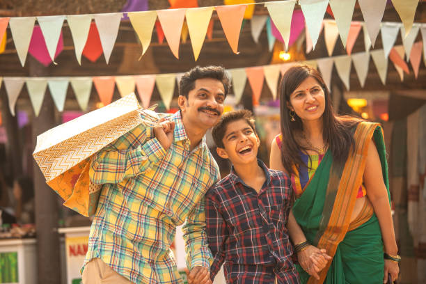 istock Parents with boy looking away and enjoying at carnival 2065531219