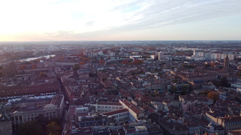 Aerial View Of Toulouse City At Sunrise In Occitania, Haute-Garonne, France.