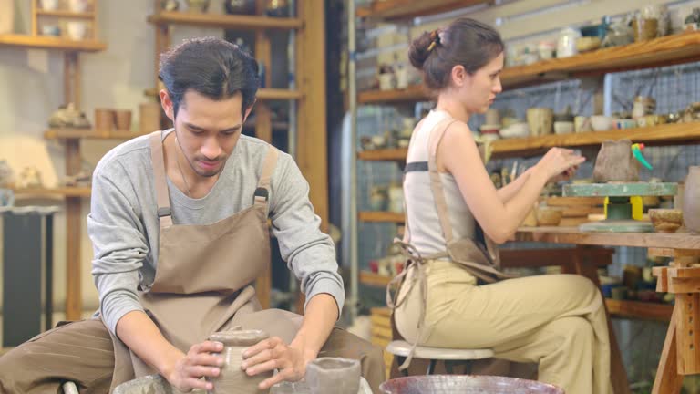 Artisans Enjoying a Pottery Workshop Session