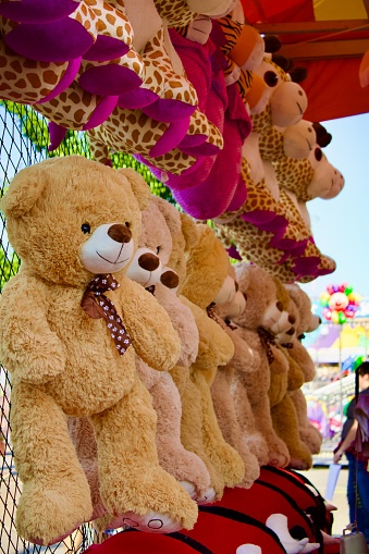 Teddy bears hanging for prizes from a festival game