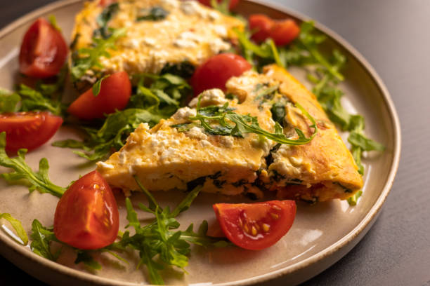 istock delicious spring frittata for a perfect brunch with arugula and cherry tomatoes close-up 2065624394