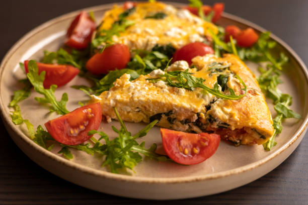 istock delicious spring frittata for a perfect brunch with arugula and cherry tomatoes close-up 2065624519