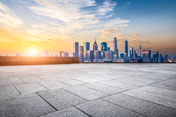 istock Empty square pavement and city skyline at sunset 2065632968