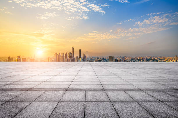 istock Empty square pavement and city skyline at sunset 2065635726
