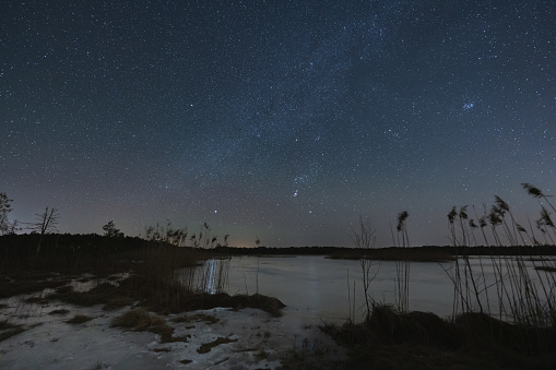 Landscape astrophoto on Lake Seli in winter. Nature of Estonia. High quality photo