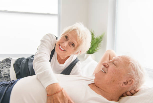 istock Senior 80 years old Couple Relaxing In Bed together 2065682646