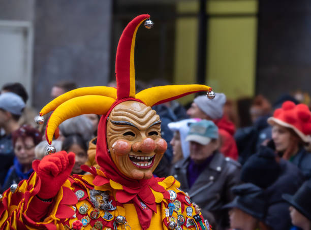 Portrait of a boy in a krampus costume, black goat skin, horns and a wooden mask, Austria, Salzburg. High quality photo