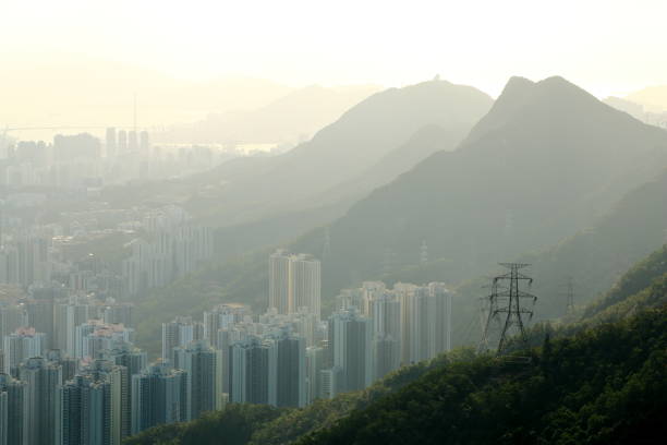 A crowded city, a dense cluster of building, blue sky