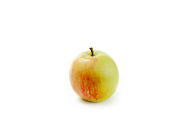 Fresh green apple isolated on white background with clipping path.