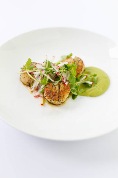 istock Pan Seared Scallops with Pea Puree and Kombu Butter 2065701223