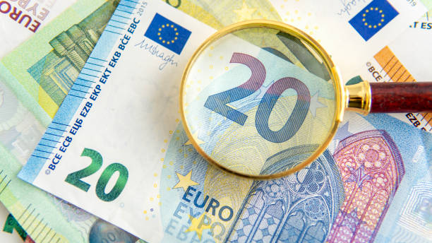istock Magnifying glass on 20 euro banknote 2065708664