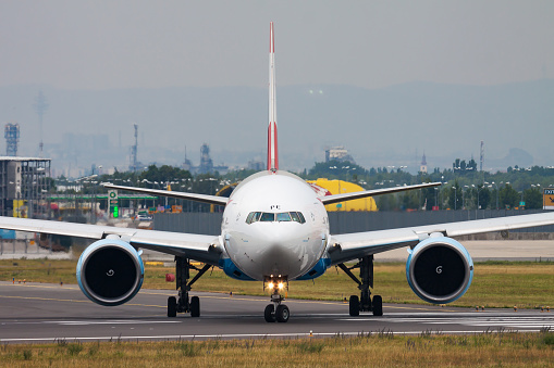 Vienna, Austria - July 5, 2014: Austrian Airlines Boeing 777-200 OE-LAY passenger plane at Vienna International Airport