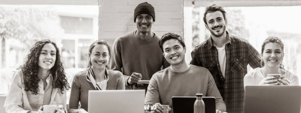 istock Horizontal banner or header with smiling multiethnic coworkers looking at camera making team picture in modern office together - Diverse work group or department laugh posing for photo at workplace 2065795661