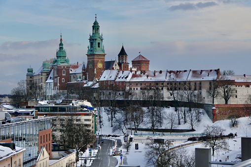 The beautiful Wawel Castle complex sits in its glory on a hill in Krakow, including the famous Royal Archcathedral Basilica of Saints Stanislaus and Wenceslaus.