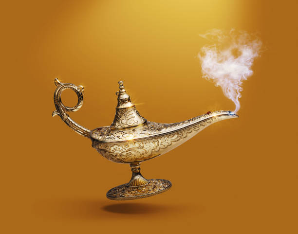 istock Golden magic lamp on gold background 2065805691