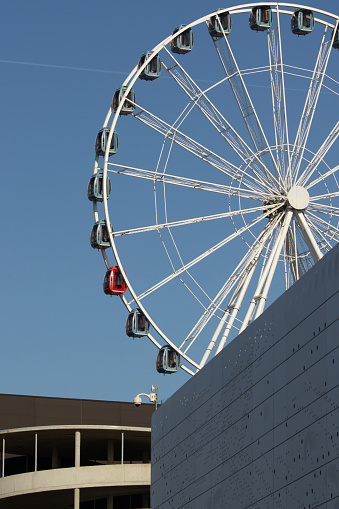 observation wheel, a giant wheel against blue sky