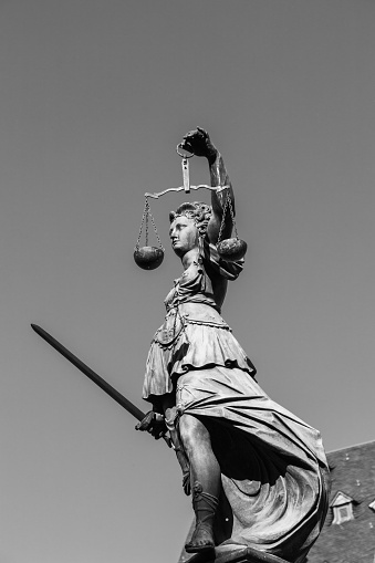 Statue of Lady Justice in front of the Romer in Frankfurt - Germany