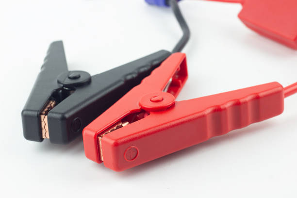 istock Start cable, starter cable with connectors for jump charger, isolated from background 2065839077