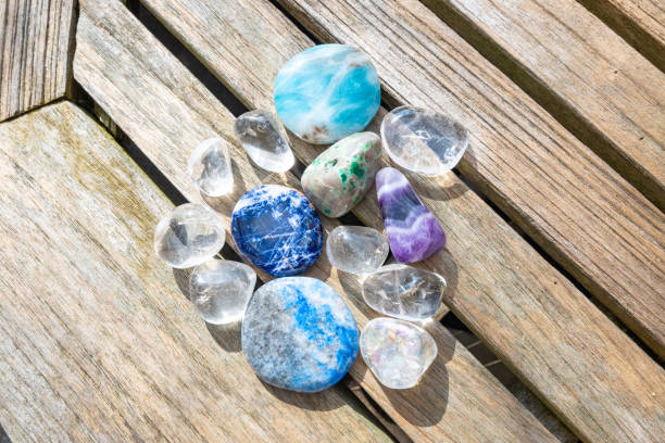 istock Various stones with wooden background. 2065895831
