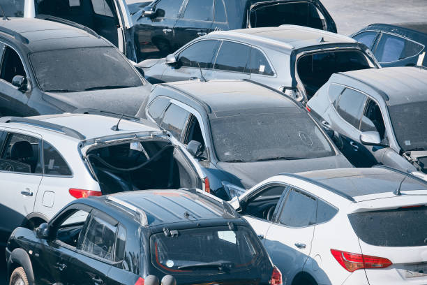 Cars on a parking Broken dusty cars parked on a outdoor parking obsolescence stock pictures, royalty-free photos & images