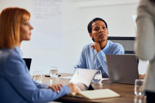 istock Business people working at the office, talking to each other. 2065938859